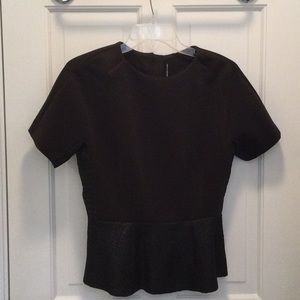 Walter baker peplum top with exposed zipper when snake print fabric